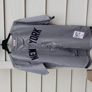 Mitchell & Ness NY Yankees Joe DiMaggio Cooperstown Collection jersey.